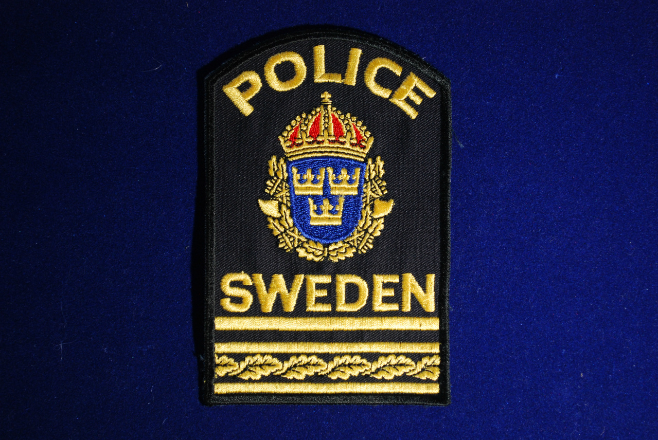 Märke för polis i utlandstjänst
Inspektör med särskild tjänsteställning